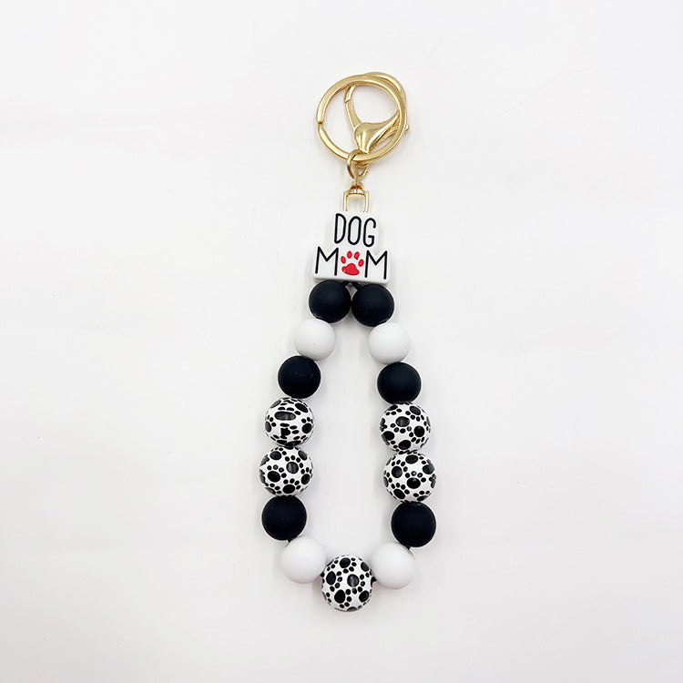 Wholesale Silicone Pumpkin Cow Ghost Dog Paw Wooden Bead Bracelet Keychain